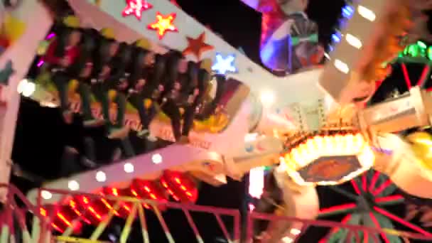 colorful fun fair ride at night - Footage, Video