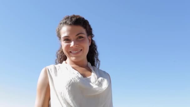 woman enjoying a summer day and smiling - Video, Çekim