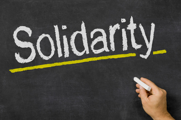 Solidarity written on a blackboard - Fotó, kép
