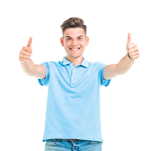young man showing the thumbs up gesture. - Photo, Image