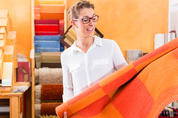 Interior Designer buying rug or carpeting - Photo, Image