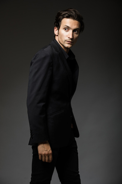attractive man in black suit - Foto, Imagem