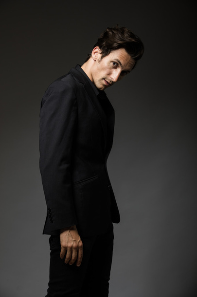 attractive man in black suit - Photo, Image
