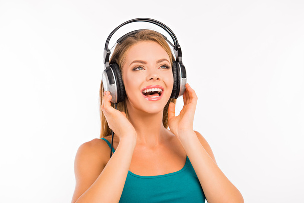 Cute girl listening to music on headphones - Foto, Imagem