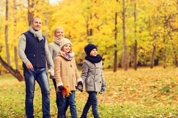 happy family in autumn park - Valokuva, kuva