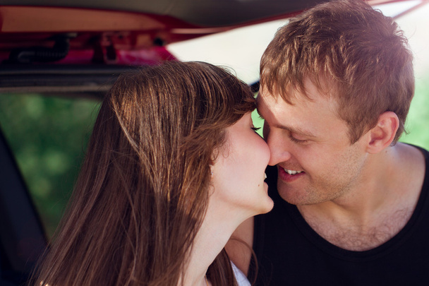 young smile couple romantic kissing sitting in car , summer time - Foto, immagini