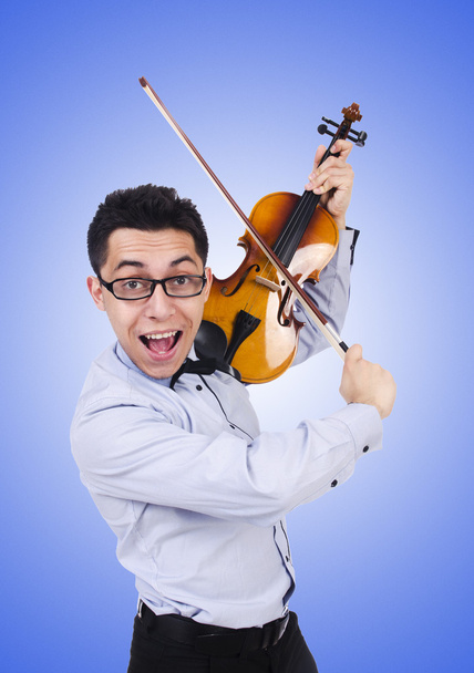 Забавна людина зі скрипкою проти градієнта
 - Фото, зображення
