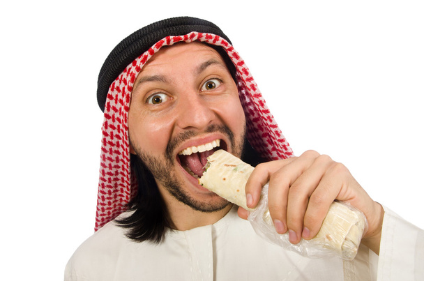Αραβική άνθρωπος τρώει απομονωθεί σε λευκό - Φωτογραφία, εικόνα
