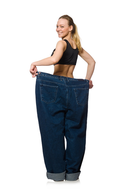 Dieting concept with big jeans - Zdjęcie, obraz