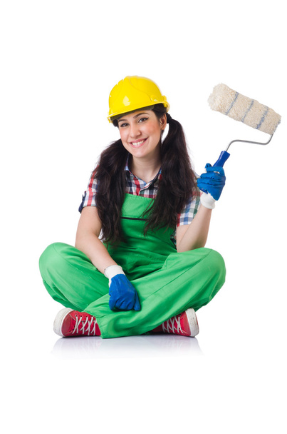 Vrouwelijke workman in groene overall geïsoleerd op wit - Foto, afbeelding