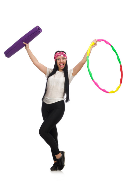 A girl in sport suit with hula hoop - Photo, image
