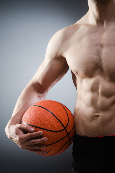 Muscular basketball in sports concept - Foto, imagen