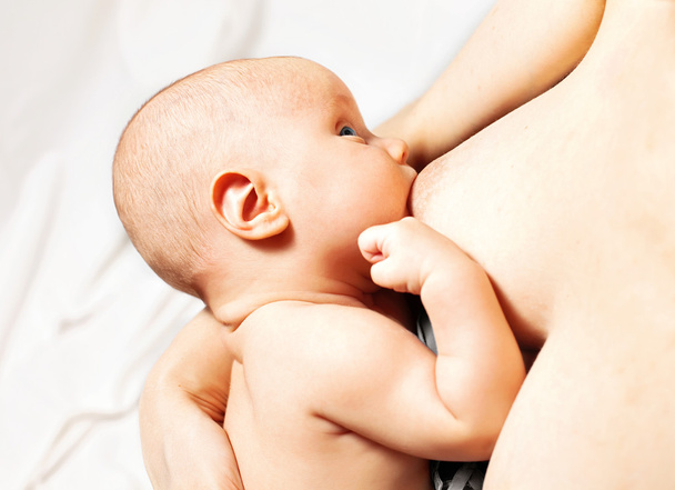 Little baby breast feeding - Foto, immagini