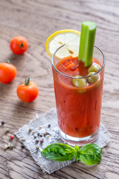 Bloody Mary cocktail on the wooden background - Fotoğraf, Görsel