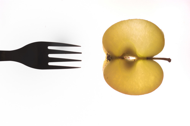 vork en apple witte achtergrond, - Foto, afbeelding
