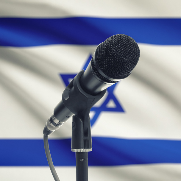 背景 - イスラエルの国旗とスタンド マイク - 写真・画像