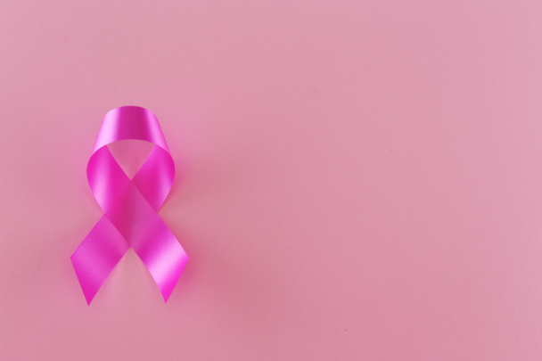 Ribbon sign on pink background - 写真・画像