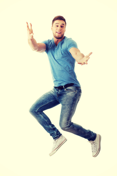 man jumping for joy - Фото, изображение