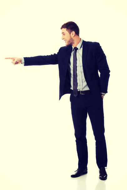 businessman pointing by finger - Фото, зображення