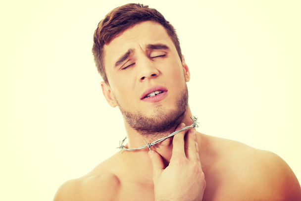 Young man with throat pain. - Foto, imagen