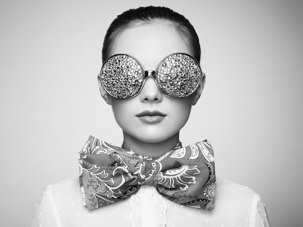 Portrait of beautiful young woman with colored glasses - Foto, Imagen