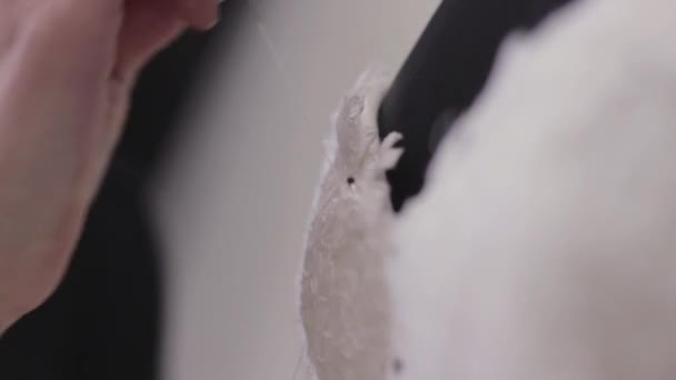 Sewing of Wedding Dresses. Seamstress sewing a wedding dress on a mannequin. - Footage, Video