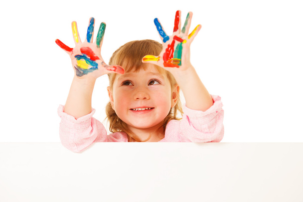 Preschooler girl with painted hands - Fotó, kép