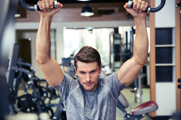 Handsome man workout in fitness gym  - Fotoğraf, Görsel