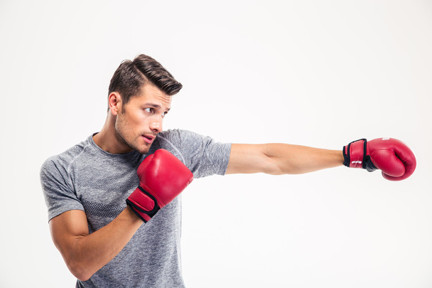 Side view portrait of a handsome man boxing - Photo, Image