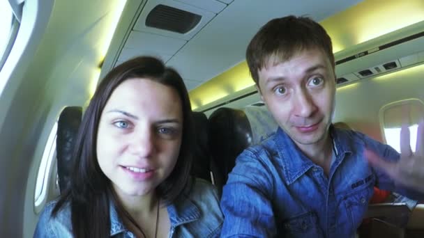 Couple in aircraft - Кадры, видео