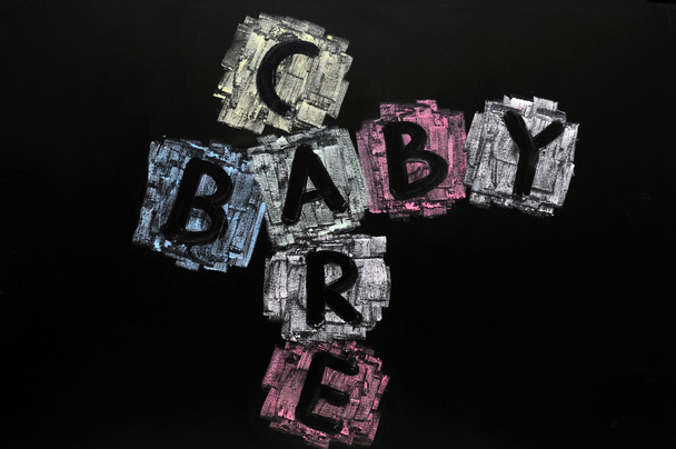 Kruiswoordraadsel van baby en zorg - Foto, afbeelding