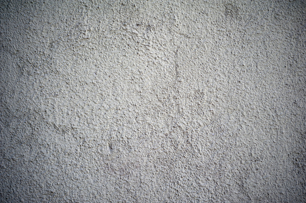 Texture of old wall covered with gray stucco - Photo, image