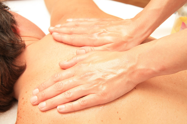 Massage of male back and shoulders - Foto, imagen