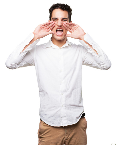 angry young man shouting - 写真・画像