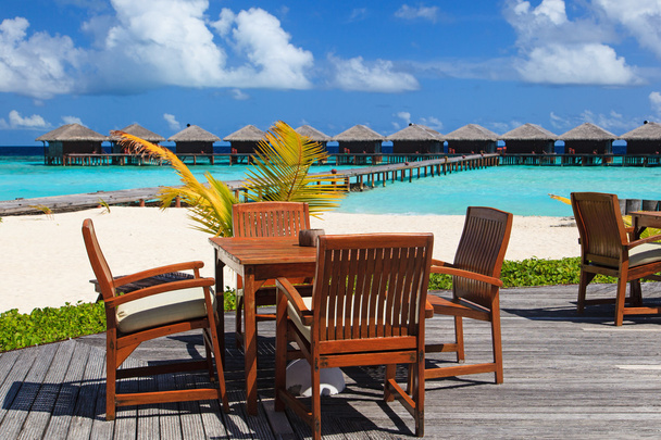 кафе на пляже курорта, роскошный отдых
 - Фото, изображение