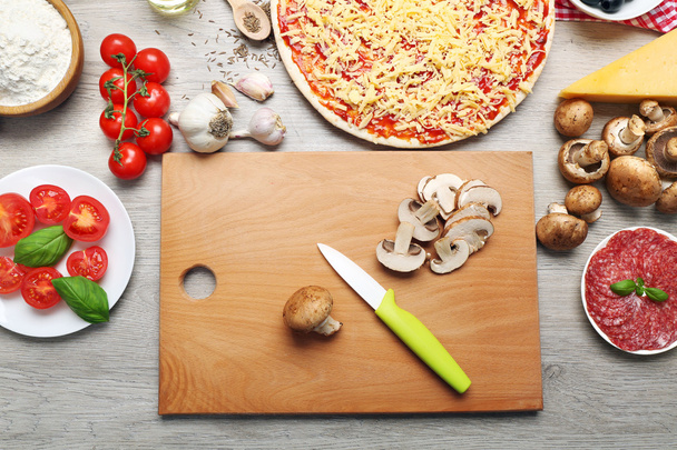 Food ingredients for pizza on table close up - Foto, Imagem