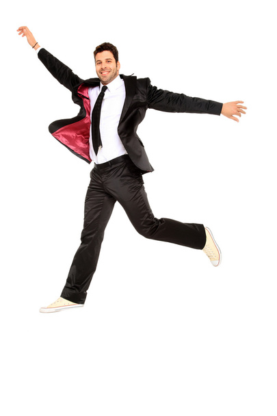 Handsome jumping man on suit - Fotoğraf, Görsel