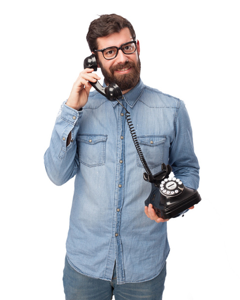 happy young man with telephone - Foto, afbeelding