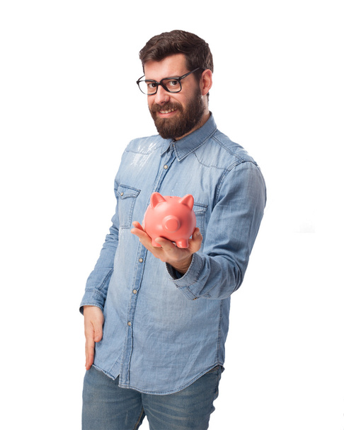 happy young man with piggy bank - Zdjęcie, obraz