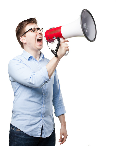 angry young man with megaphone - Fotoğraf, Görsel
