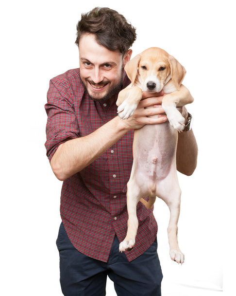 happy young man with puppy - Фото, зображення