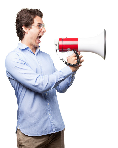 angry young man with megaphone - Foto, immagini