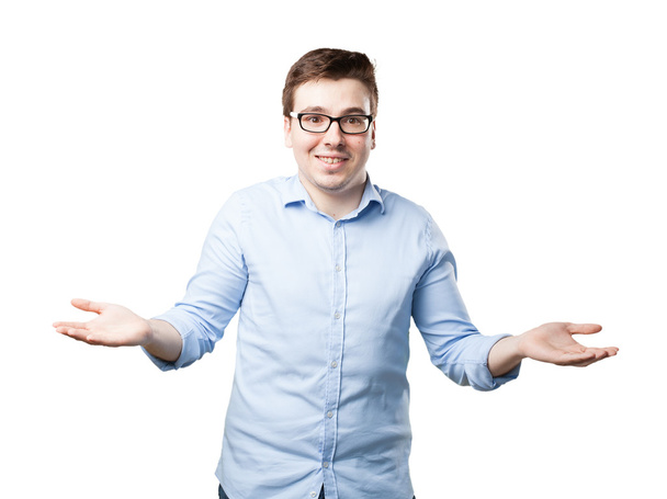 happy young man in confused pose - Foto, Imagen