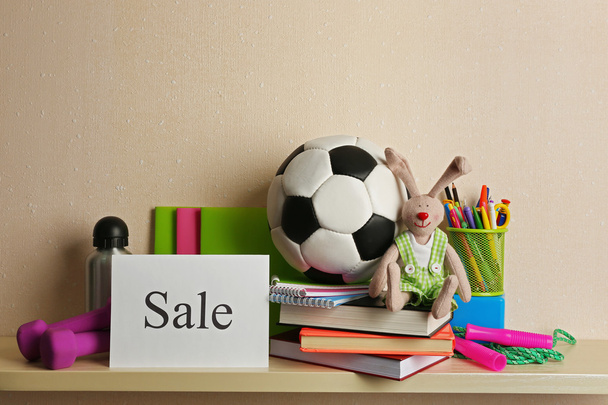 Goods for sale, on light wall background - Photo, Image