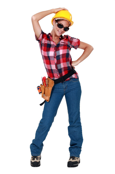 A sexy female construction worker. - Фото, изображение