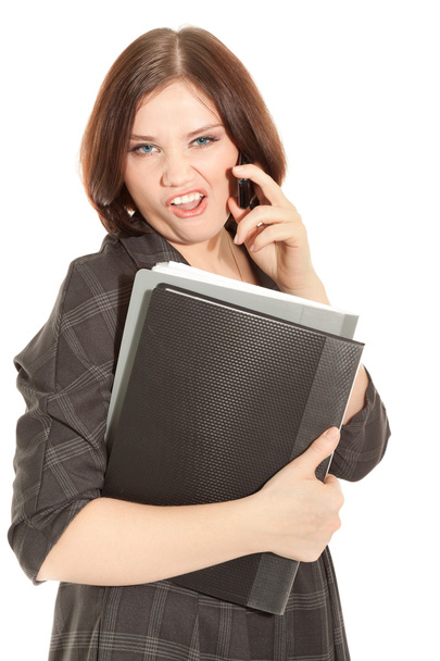 Woman calling to phone and holding a black folder - Zdjęcie, obraz