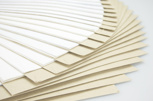 Close up step stack of paperwork and brown envelope - Fotografie, Obrázek