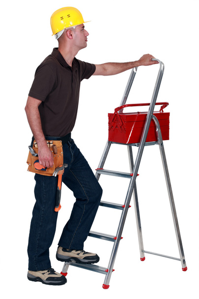 Man with a toolbox and stepladder - Фото, зображення