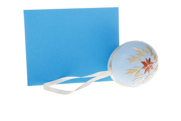 Detail of isolated blue wish card and Easter egg - Photo, Image