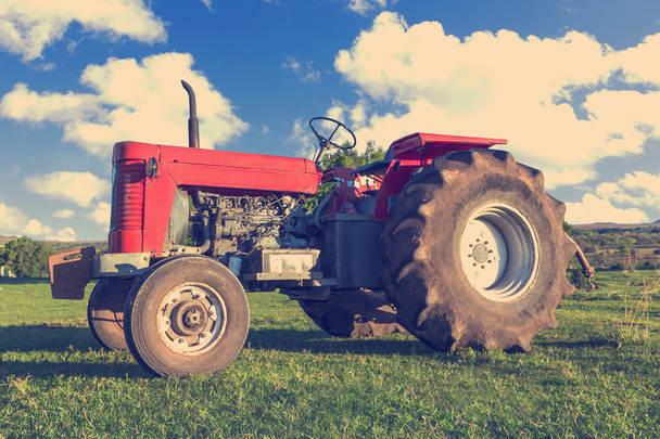Tractor on the field - Фото, изображение
